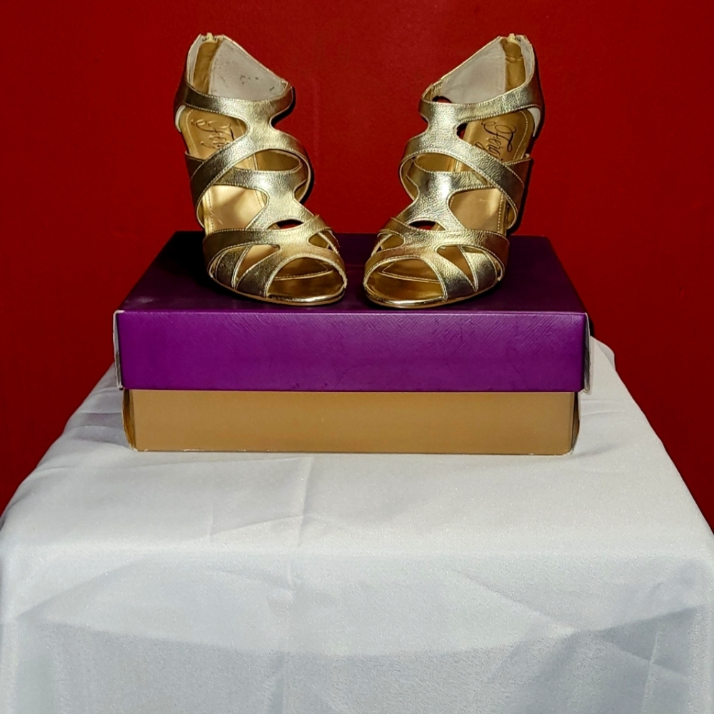 Fergie, size 8 champagne color heels.
